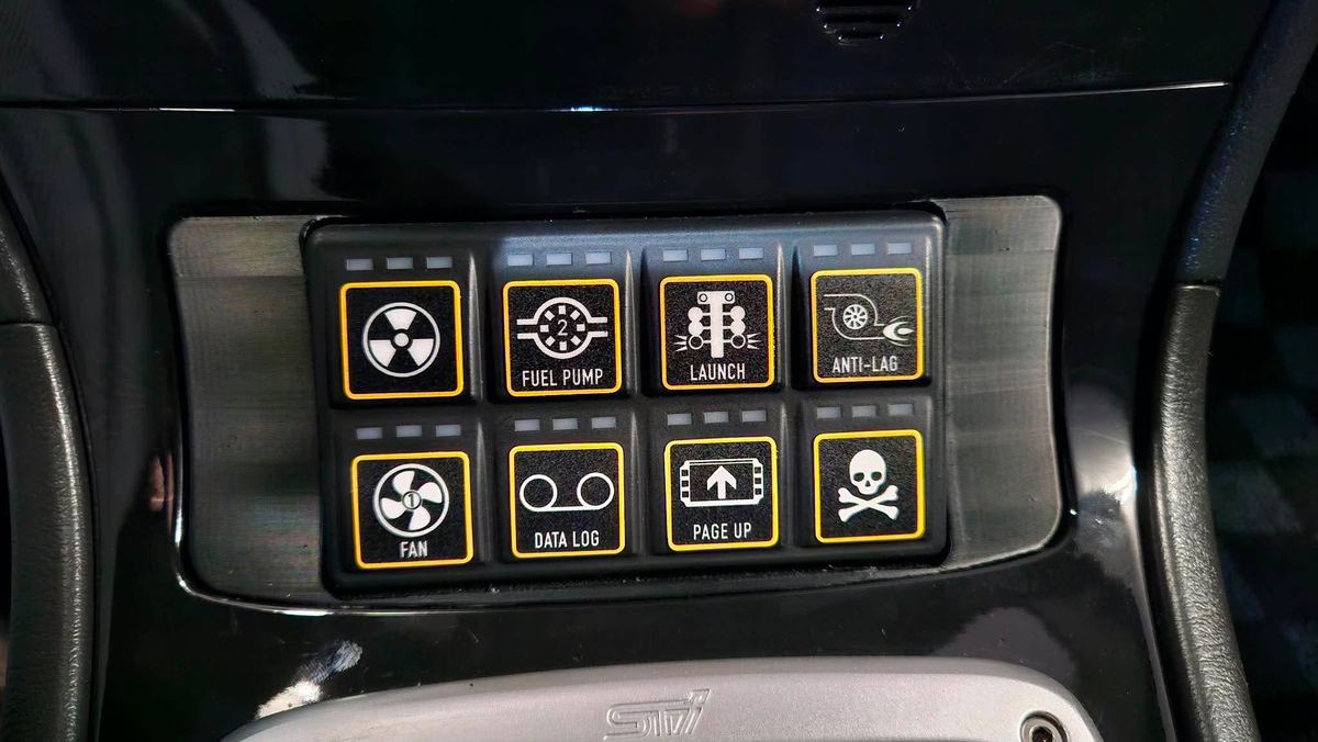 Installed keypad with labelled buttons: fuel pump, launch, anti-lag, fan, data log
